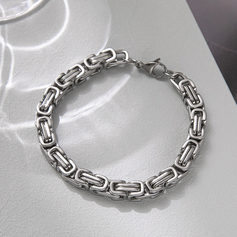 Silver-tone stainless steel Byzantine chain bracelet with a secure lobster clasp