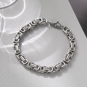 Silver-tone stainless steel Byzantine chain bracelet with a secure lobster clasp