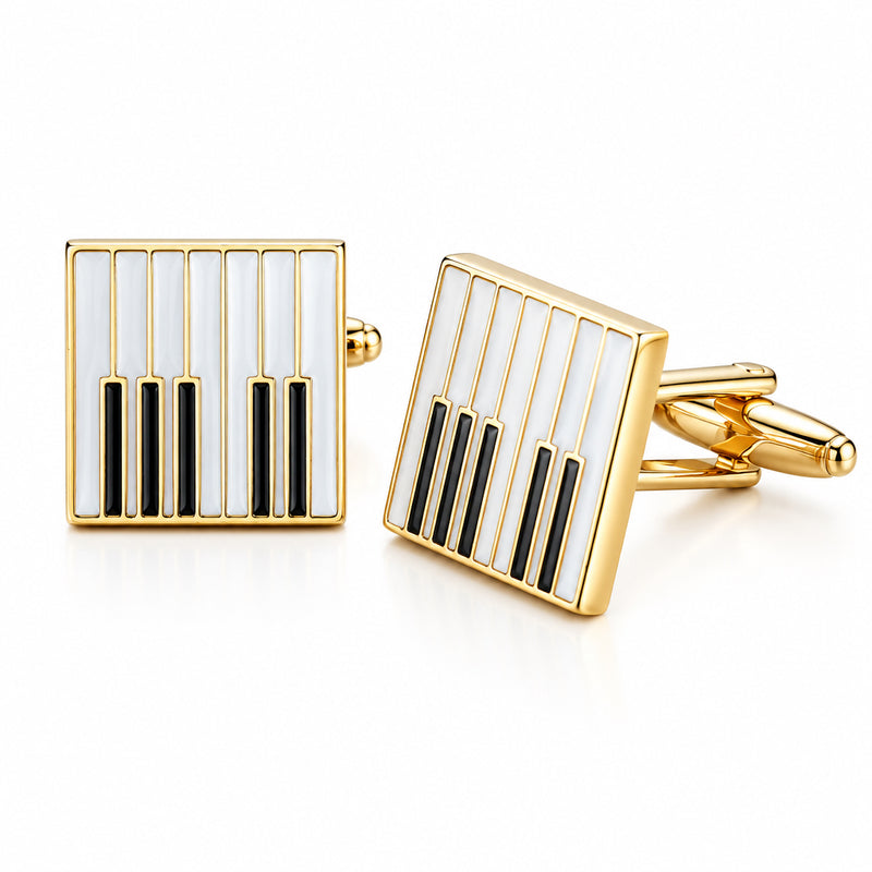 Square gold-tone cufflinks with a piano key motif in white and black enamel and bullet-back closures