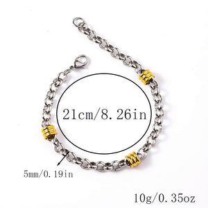 Silver-tone rolo chain bracelet featuring segmented gold-tone barrel accents and a lobster clasp