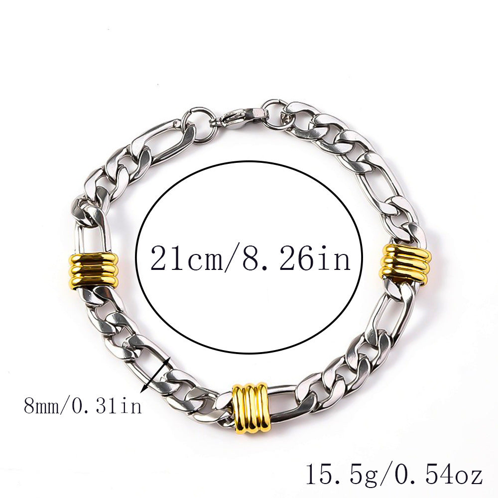 Silver-tone curb link bracelet with three gold-tone ribbed stations and secure clasp