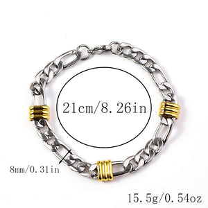 Silver-tone curb link bracelet with three gold-tone ribbed stations and secure clasp