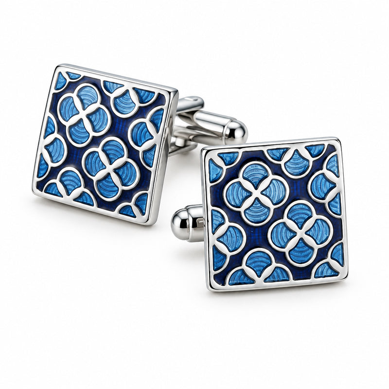 Square silver-tone cufflinks featuring a blue enamel clover pattern and swivel T-bar backing