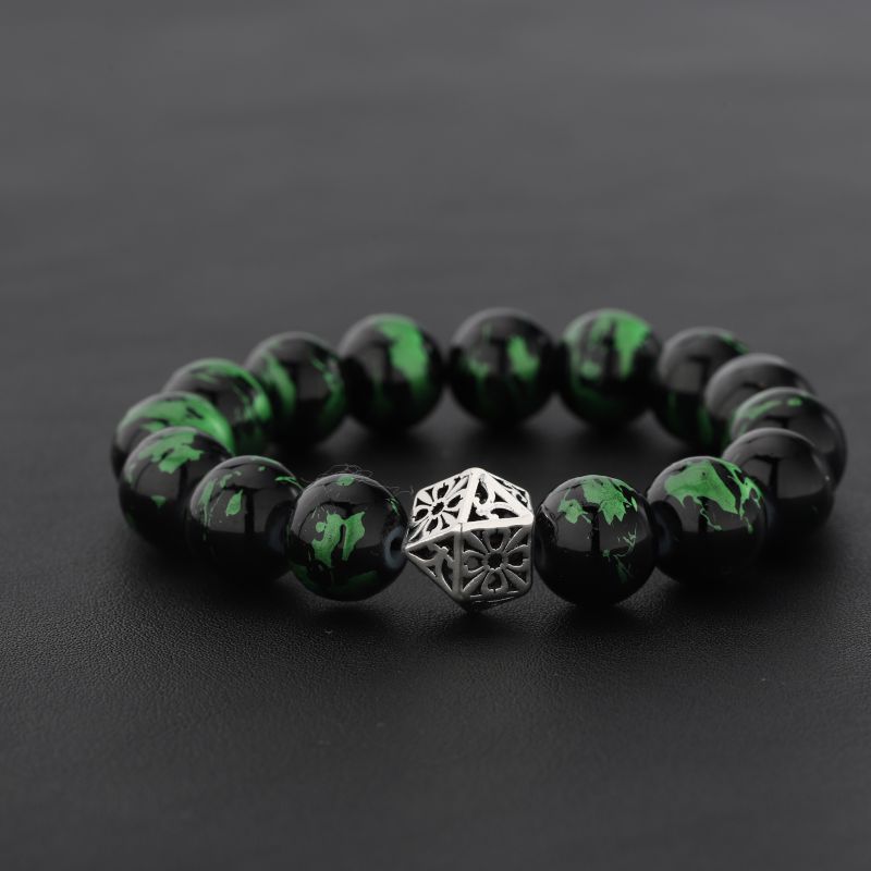 Men's black and green beaded bracelet featuring a silver-tone openwork geometric center bead