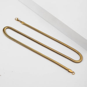 Gold-tone stainless steel round snake chain necklace with lobster clasp