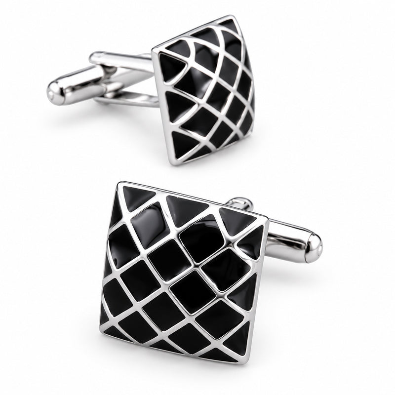 Square silver-tone cufflinks featuring a black enamel grid pattern and a polished finish