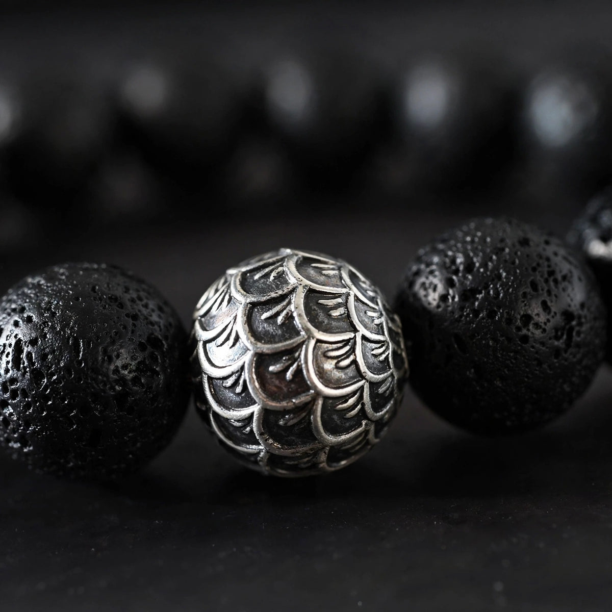 Lava Bead Bracelet With Scale-Engraved Silver-Tone Bead