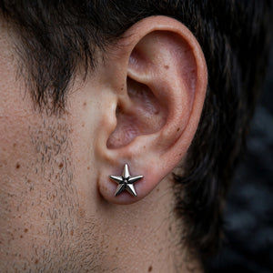 Silver-Tone Beveled-Edge Star Stud Earrings - worn on model