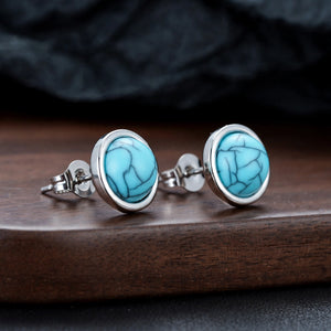 Turquoise Stone Stud Earrings with Polished Silver-Tone Border - side angle