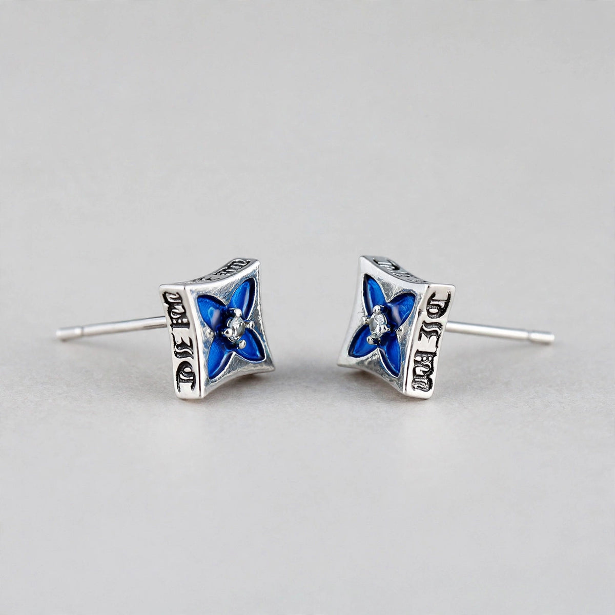 Silver-Tone Square Stud Earrings with Blue Enamel Flower - side angle
