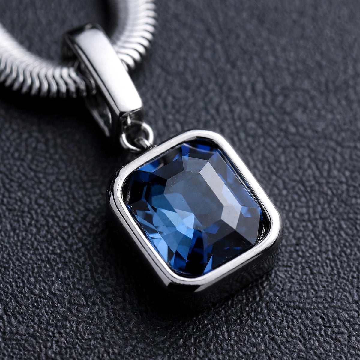 Silver-Tone Snake Chain Necklace With Blue Crystal Pendant - close-up detail