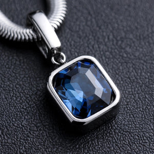 Silver-Tone Snake Chain Necklace With Blue Crystal Pendant - close-up detail