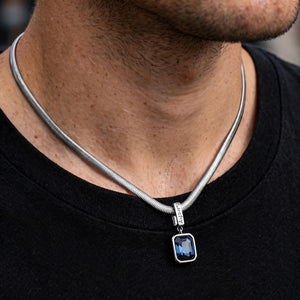 Silver-Tone Snake Chain Necklace With Blue Crystal Pendant - worn on model