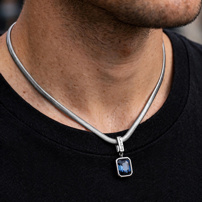 Silver-Tone Snake Chain Necklace With Blue Crystal Pendant - worn on model