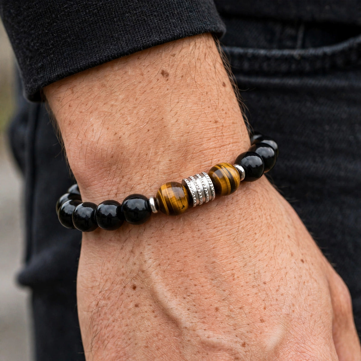 Black Beaded Bracelet with Tiger Eye and Fluted Spacer - worn on model