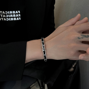Silver-Tone Cuff Bracelet With Scalloped Edge - worn on wrist