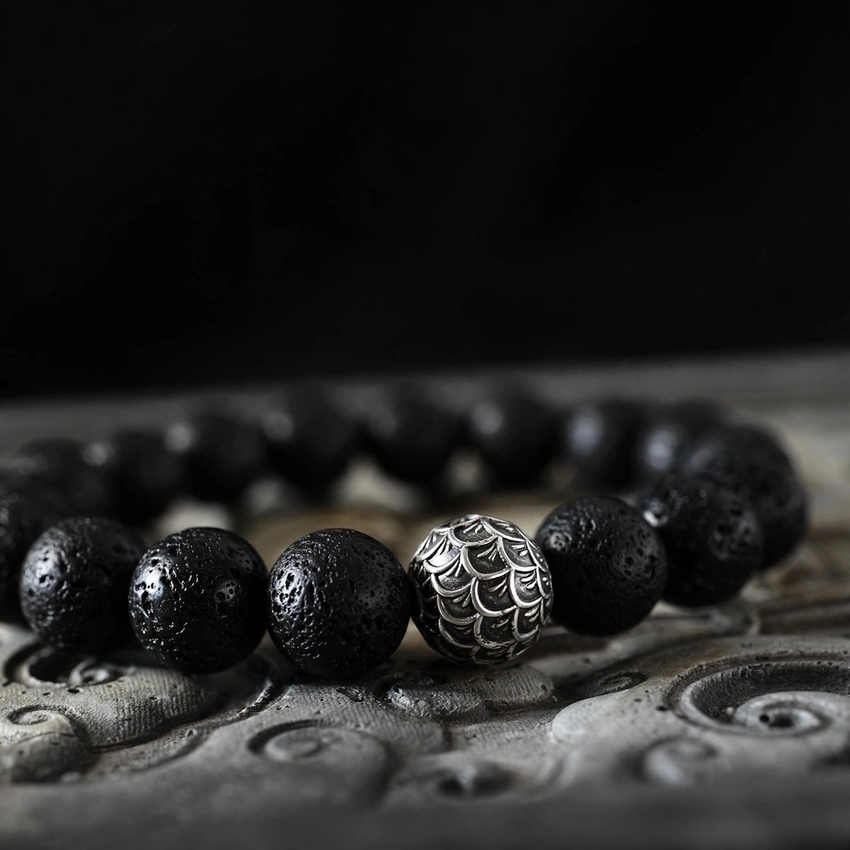 Lava Bead Bracelet With Scale-Engraved Silver-Tone Bead