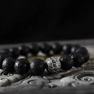 Lava Bead Bracelet With Scale-Engraved Silver-Tone Bead